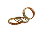 Set of orange bangle bracelets